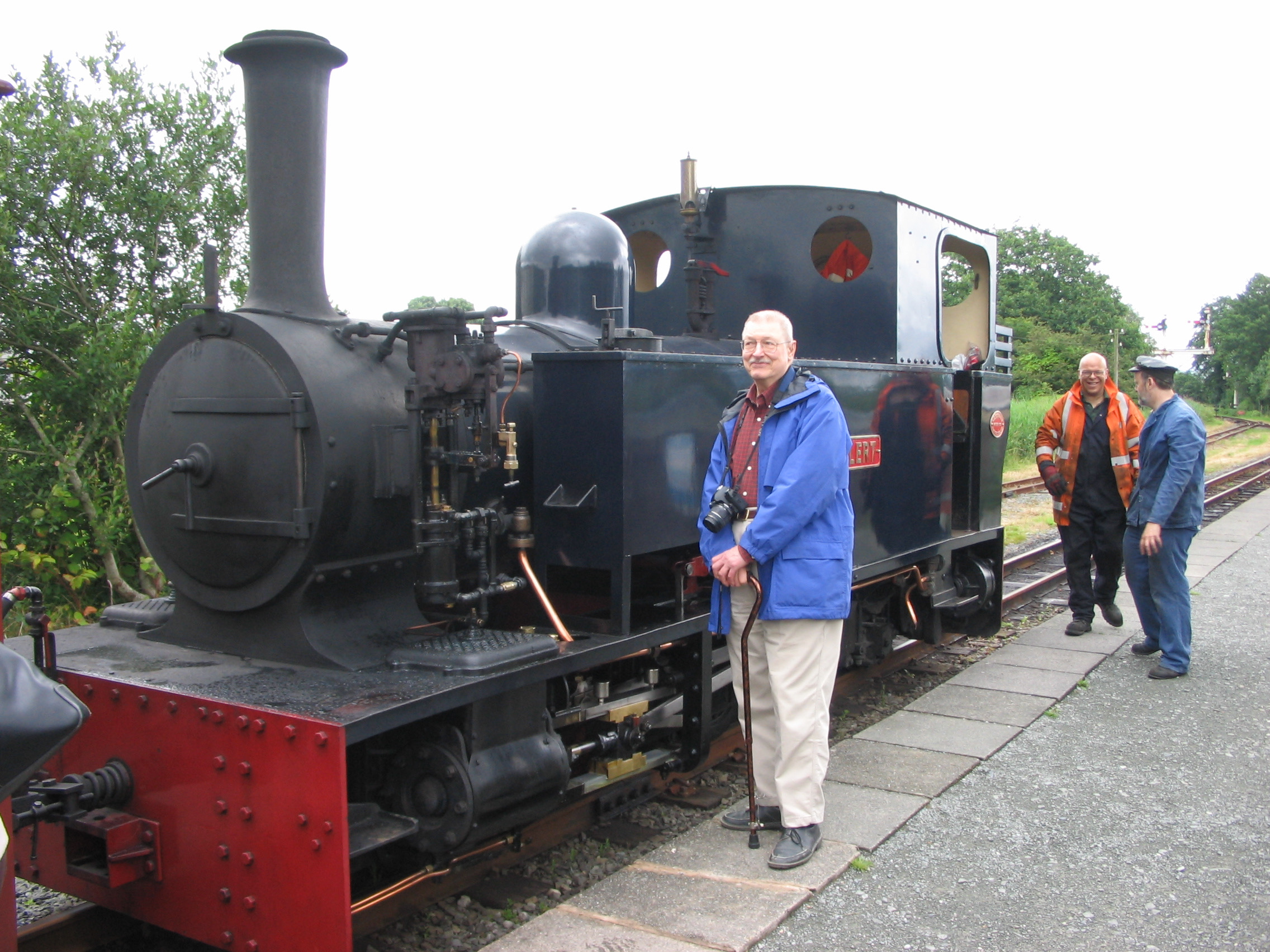 Dad by a locomotive in Wales